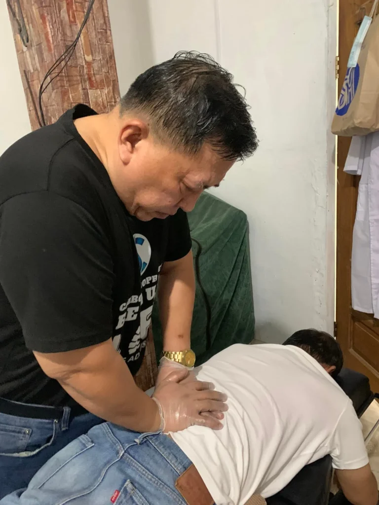 Chiropractor performing chiropractic techniques to his patient